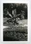 Photograph: [A Soldier Squats in a Garden]