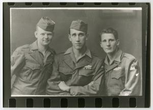 [Three Soldiers Pose for a Picture]