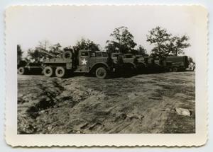 [Photograph of Wreckers and Trucks]