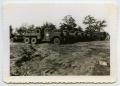 Photograph: [Photograph of Wreckers and Trucks]