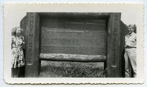 [Photograph of a Soldier and his Lady at the Mammoth Cave National Park Sign]