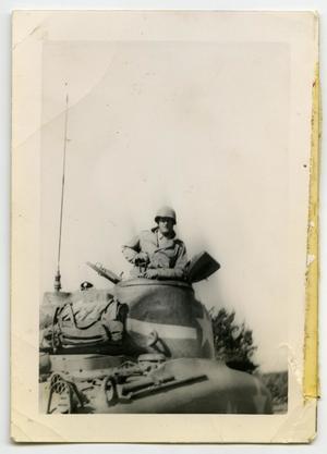 [Photograph of Soldier in Tank Turret]