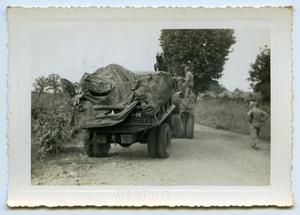 [Photograph of Tractors on the Road]