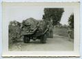 Photograph: [Photograph of Tractors on the Road]
