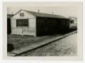 Photograph: [Outside of Barracks at Camp Barkeley]