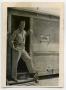 Photograph: [Photograph of Harold Wells in Hut]