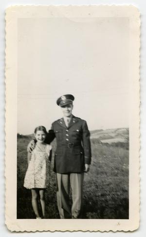 [Photograph of a Soldier and a Young Girl]