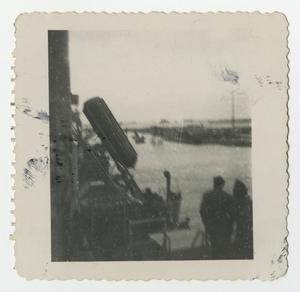 [Two Soldiers Standing on a Ship's Deck]