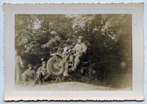 [Photograph of a Soldier's Motorcycle Jump]