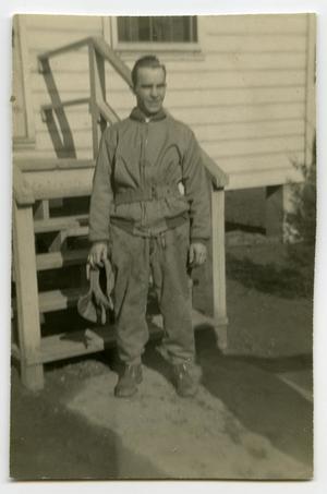 [A Soldier Standing in Front of a Small Staircase]