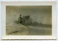 Photograph: [Photograph of a Soldier on a Motorcycle]