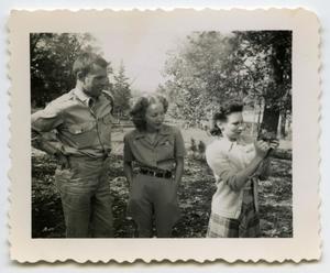 [Photograph of a Soldier and Two Ladies]