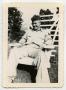 Photograph: [Photograph of a Soldier in a Lawn Chair]