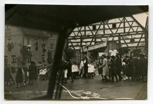 [Photograph of Procession in Street]