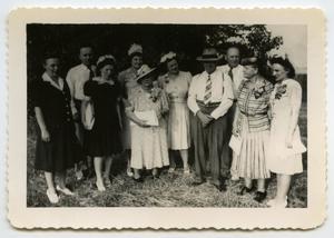 [Photograph of a Group of Civilian Men and Women]