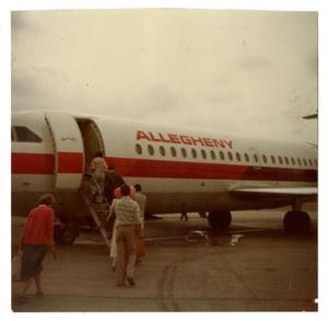 Primary view of object titled '[Photograph of People Boarding an Airplane]'.