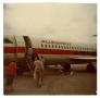 Thumbnail image of item number 1 in: '[Photograph of People Boarding an Airplane]'.