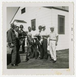 [Eight Men With Caught Fish]