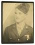 Photograph: [Young Man in Decorated Uniform]