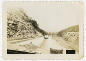 Primary view of object titled '[Car on Paved Road]'.
