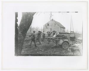 Primary view of object titled '[German Prisoners Being Marched to a Building]'.