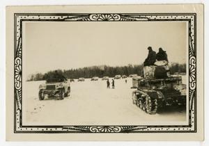 [Vehicles in Snowy Field]