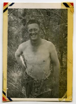 [Photograph of Shirtless Soldier]