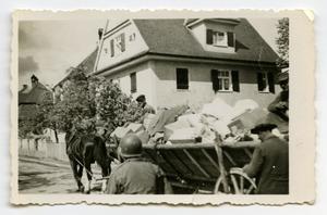[Civilians Hauling Boxes by Wagon]