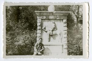 [A Soldier Standing in Front of a Monument]