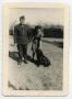 Photograph: [Photograph of a Lieutenant, and Lady, and a Dog]