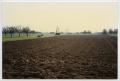 Photograph: [Overlooking a Field Near Herrlisheim, France]