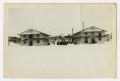 Photograph: [Two Story Barrack Buildings]