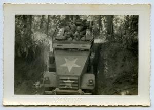 [Photograph of a Carrier Vehicle on a Steep Slope]