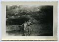 Photograph: [Two Men Sitting on the Rocks]