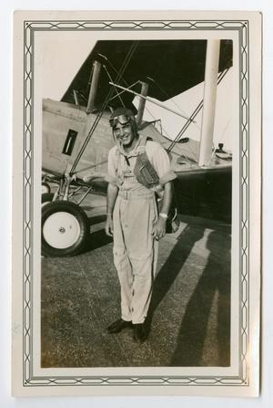 [Photograph of Arthur J. Pierce by an Airplane]