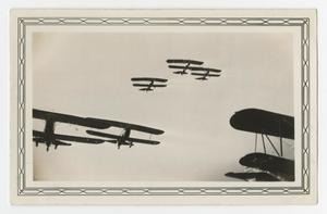 Primary view of object titled '[Photograph Looking up at Planes Above]'.