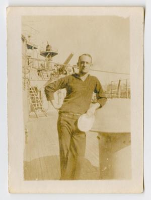 [Photograph of a Sailor on the Deck of the U.S.S. Texas]