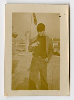 Primary view of object titled '[Photograph of a Sailor on the Deck of the U.S.S. Texas]'.