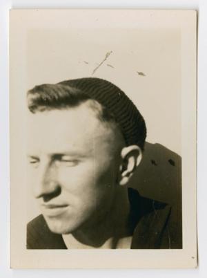 Primary view of object titled '[Photograph of a Sailor Looking Dazed]'.