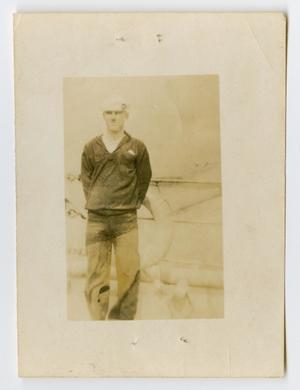 [Photograph of a Sailor on the Edge of the U.S.S. Texas]