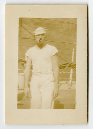 [Photograph of a Sailor Smoking Aboard Ship]