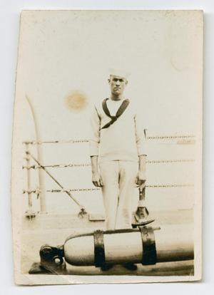 [Photograph of a Sailor on the Deck of the U.S.S. Texas]
