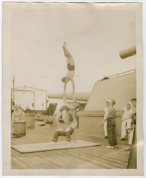 [Photograph of Three Sailors Performing Acrobatics]