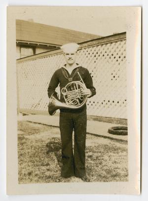 [Photograph of a Sailor Holding a French Horn]