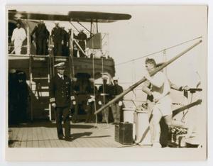 [Photograph of a Captain W. G. Assetson Greeting Crew]