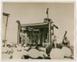 Photograph: [Photograph of a Group of People Singing]