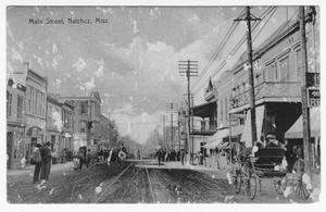 Primary view of object titled '[Postcard of Main Street in Natchez, Mississippi]'.