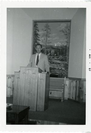 Primary view of object titled '[Brother McKenzie at a Pulpit]'.