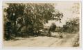 Primary view of [Two Cars near the Brazos River]