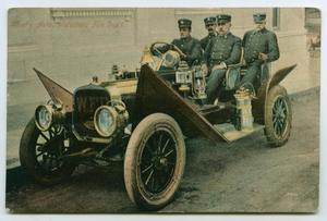 [Postcard of Fire Fighters in an Automobile]